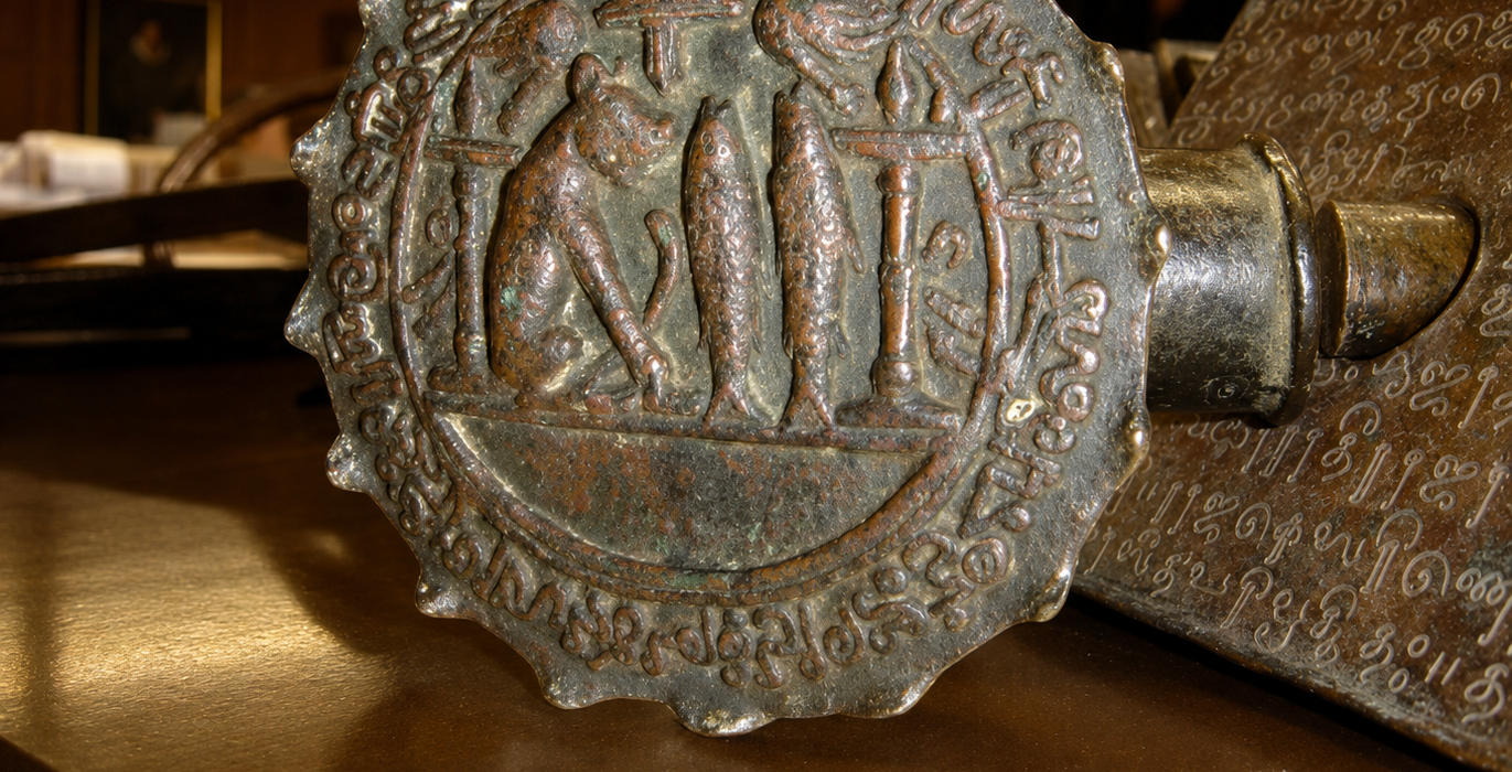 Close-up of the Anaimangalam Copper Plates with royal seal
