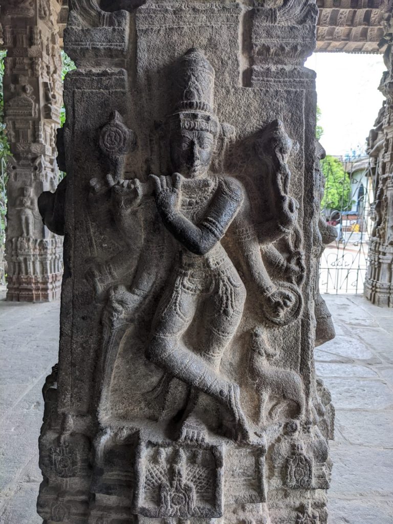 Elaborately sculpted pillars in the hall at Varadaraja Perumal Temple