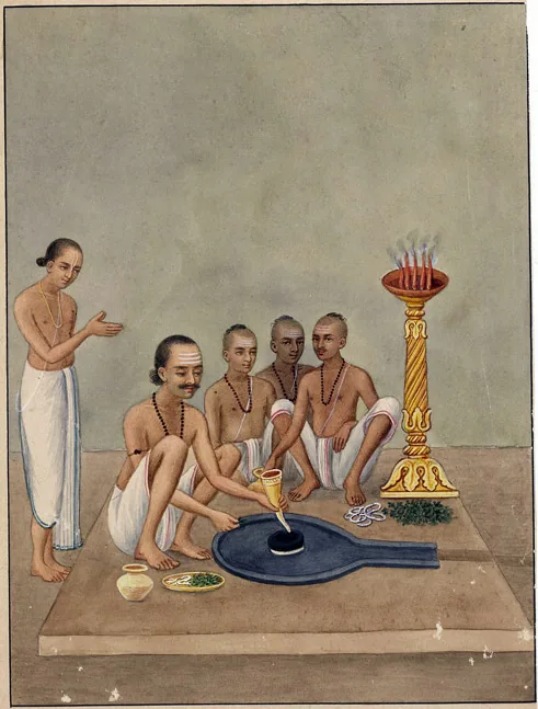 Priests conducting worship inside the Baijnath temple
